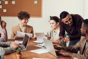 Group Of People Sitting Indoors